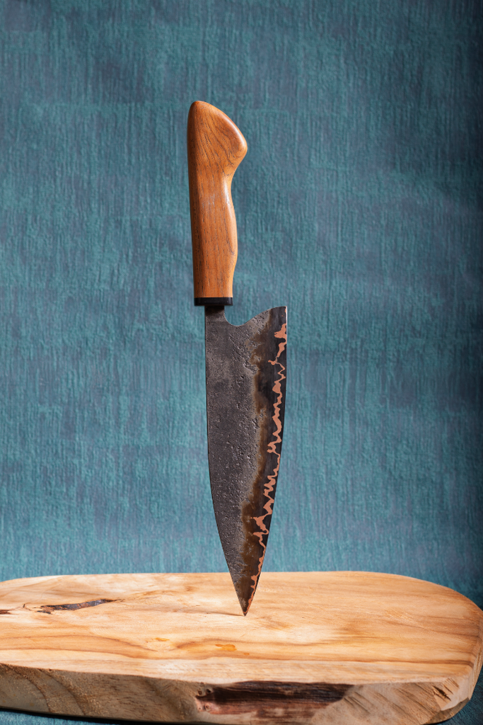 80CrV2 Black Cumai with a teak handle and buffalo horn