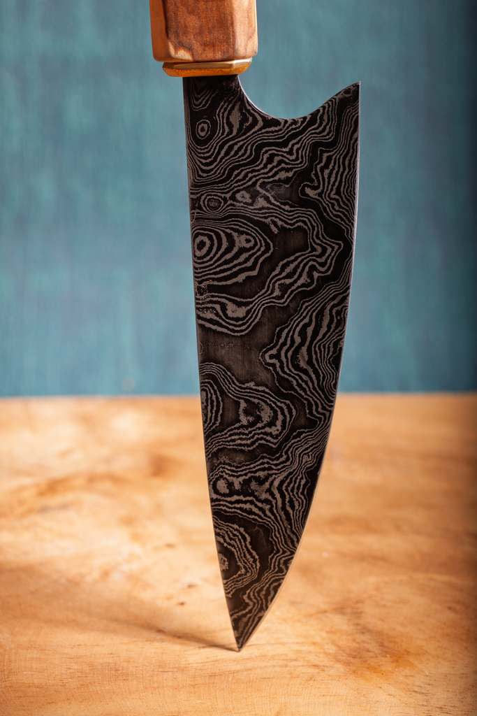 Ladder damascus knife with a pear wooden handle